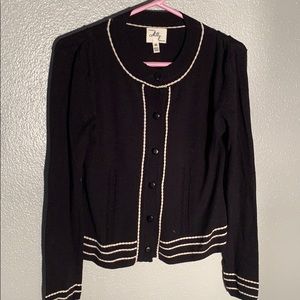 Black Milly cardigan with white detail.